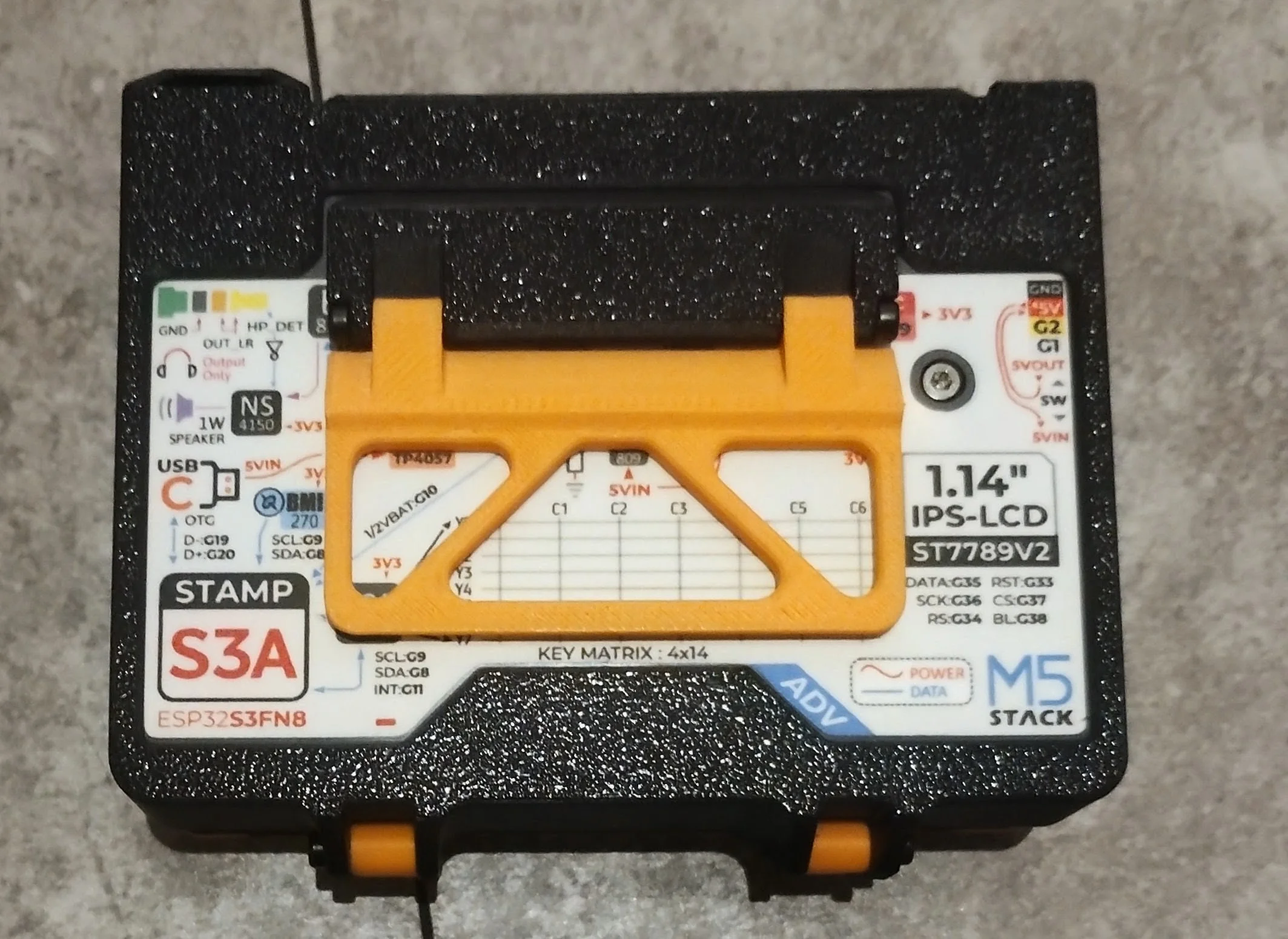 The stand folded against the back of TERM512